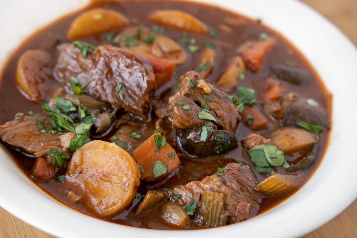 white bowl of guinness beef stew