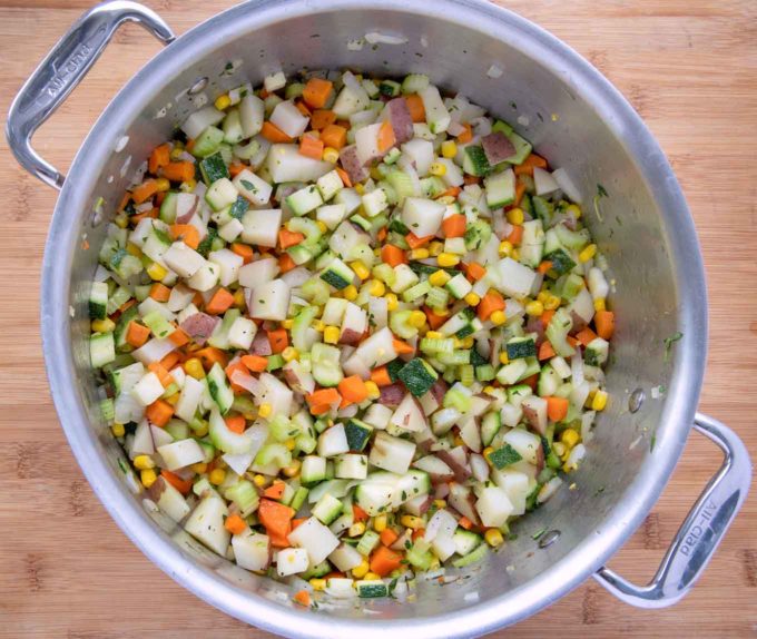 vegetables in a large pot to make seafood soup