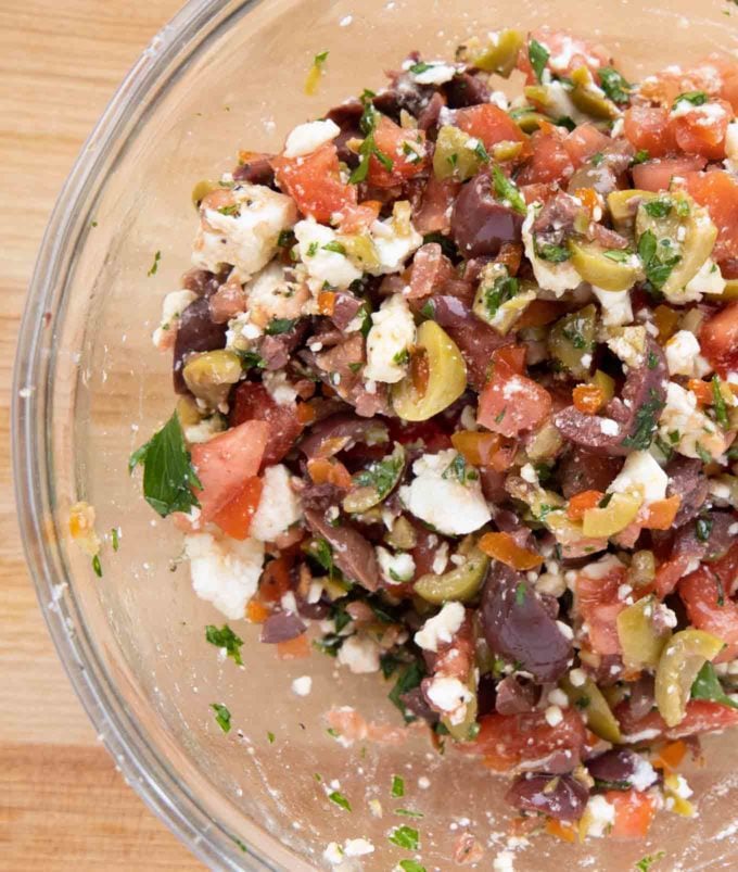 olive feta tapenade in a glass bowl