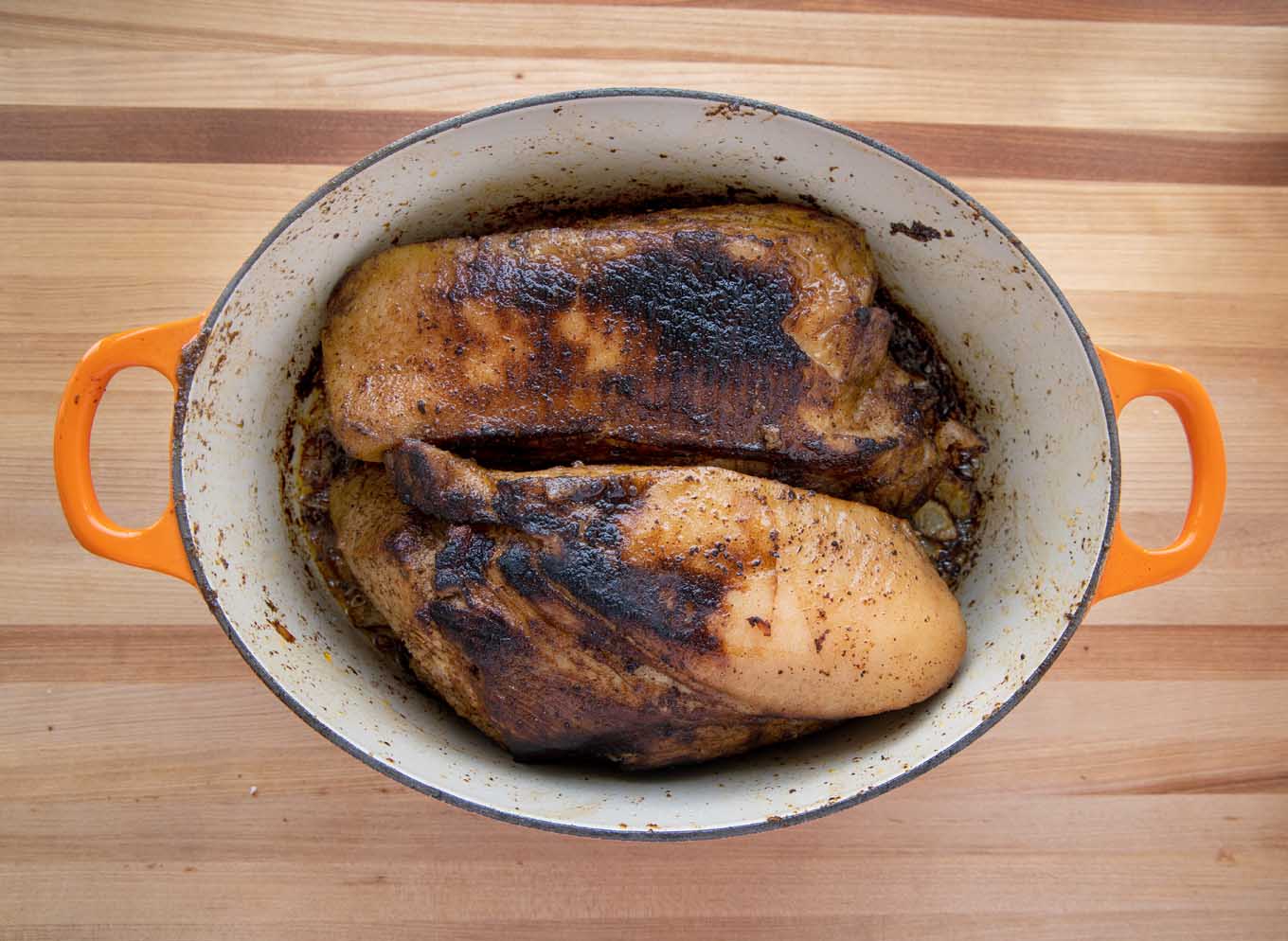  seared pork roasts in a dutch oven