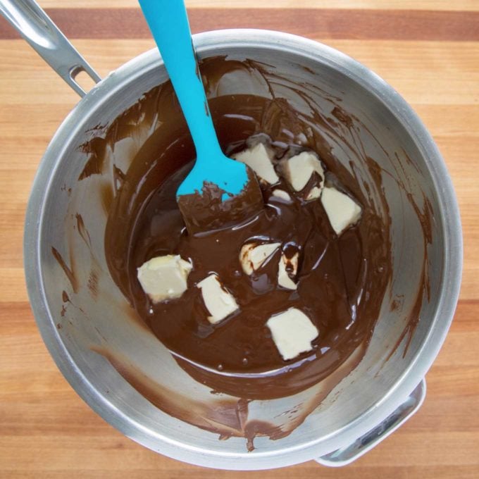 butter added to melting chocolate