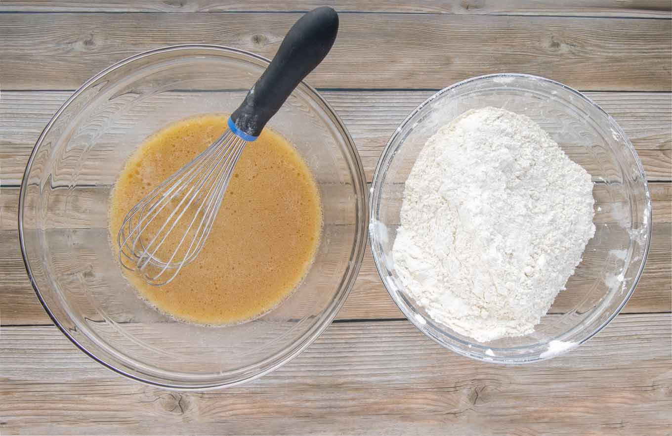 bowl with yeast mixture and whisk, bowl with flour 