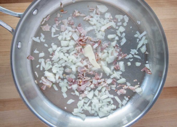 onions and bacon in a saute pan