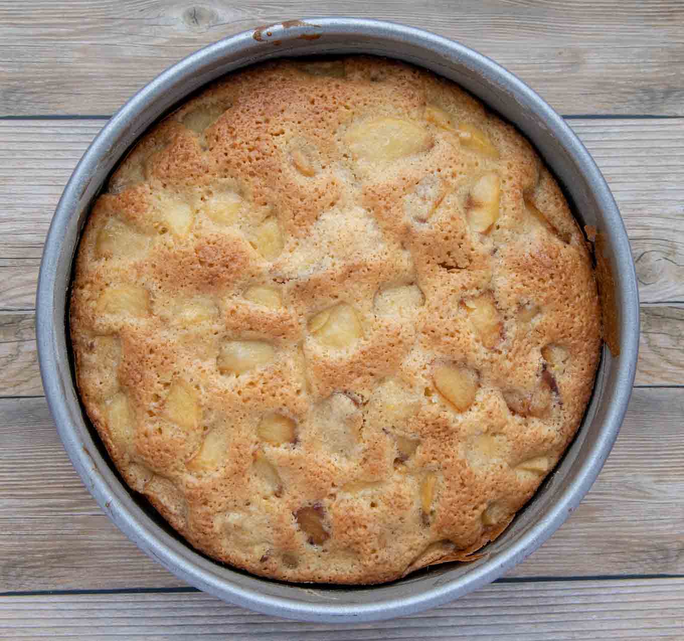 fully baked apple cake in pan