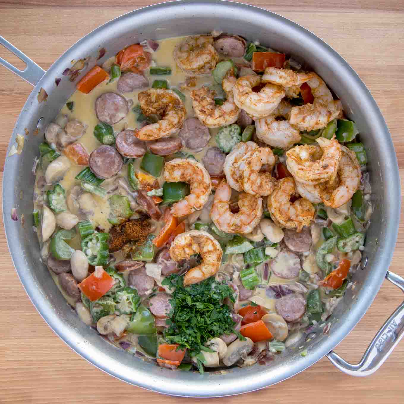 shrimp added back into skillet with the rest of the cooked ingredients