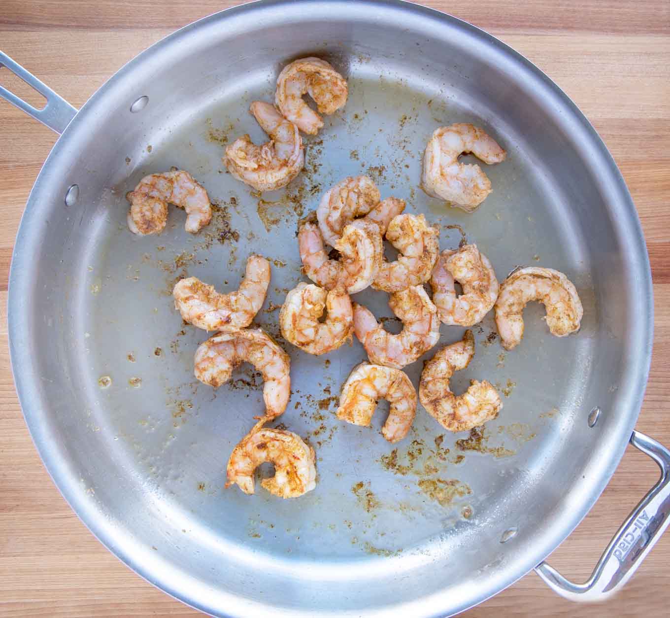 shrimp cooking in a large skillet