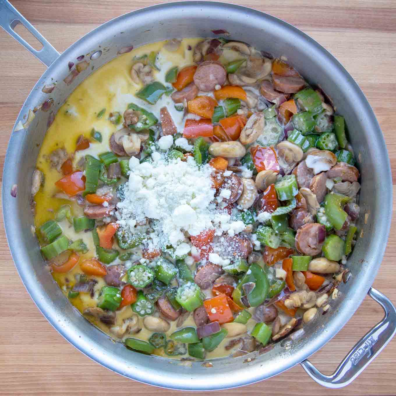 Stock, cream and cheese added to the skillet