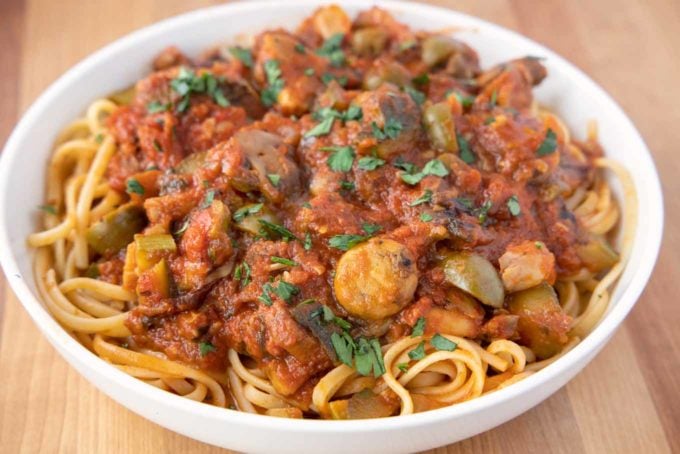 vegetarian sauce over pasta in a white bowl