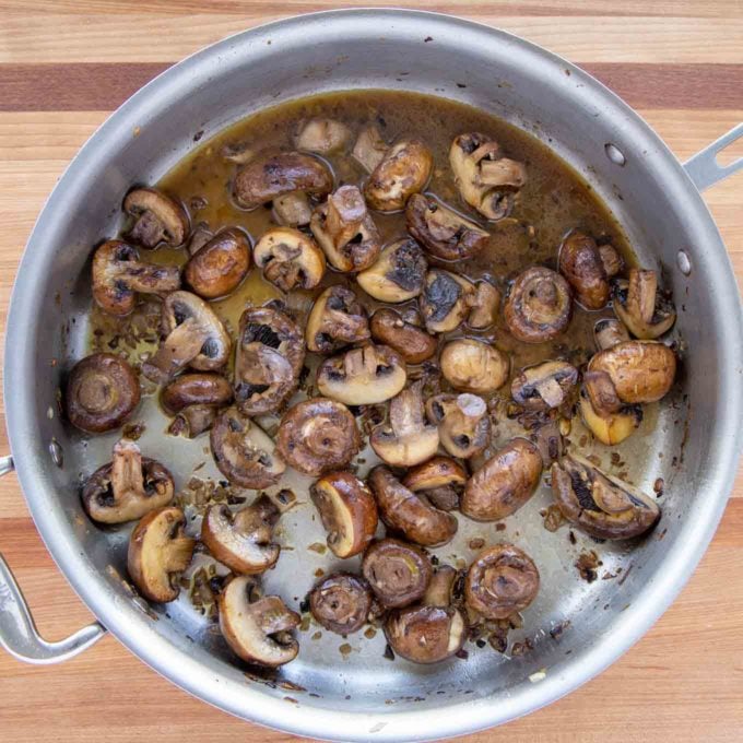 cooked mushrooms, shallots and garlic in the skillet
