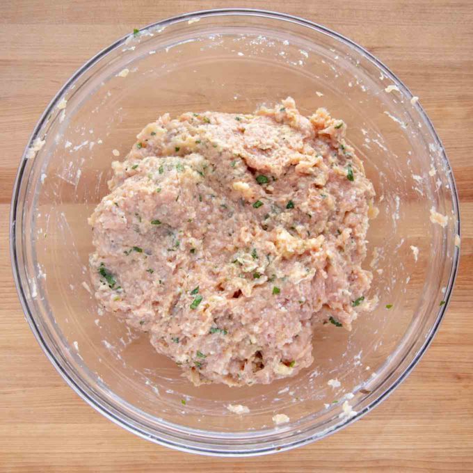 finished chicken meatball mix in a glass bowl