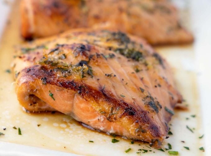 crispy browned Irish whiskey salmon on a white platter