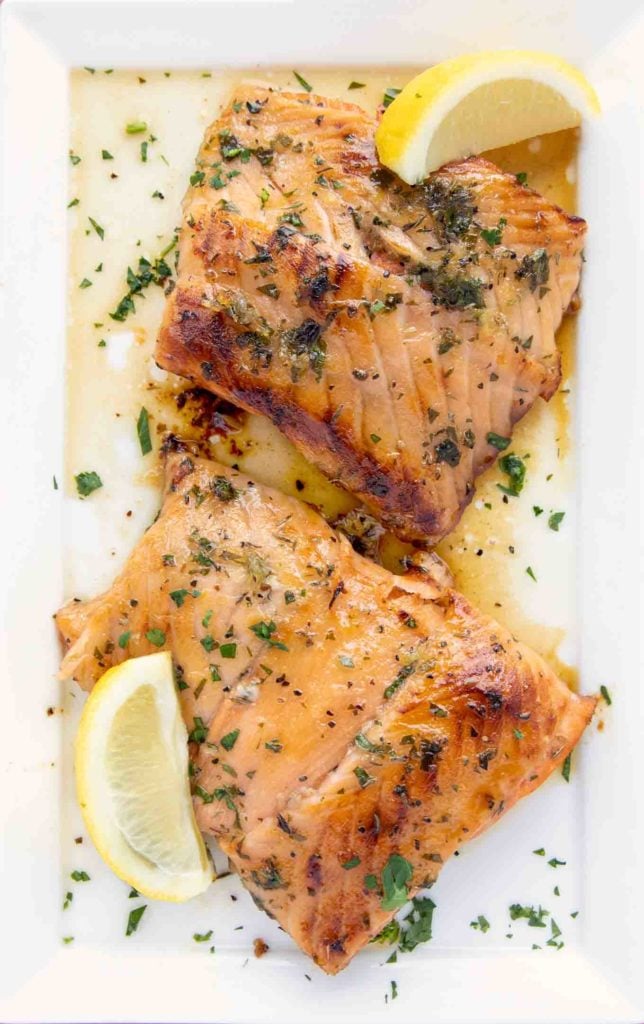 two portions of Irish Whiskey Salmon on a white platter