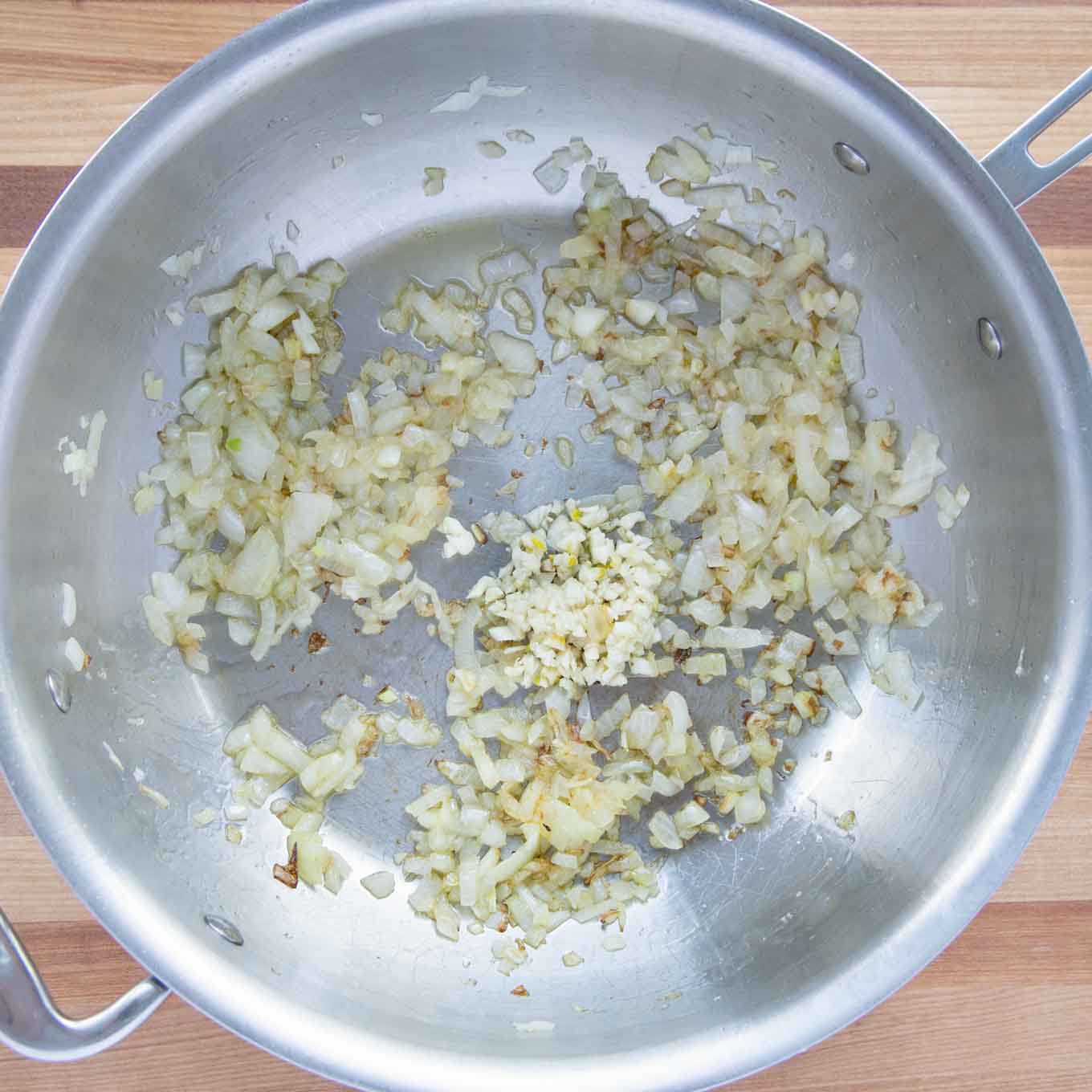 Sauteed onions and garlic in a large saute pan.