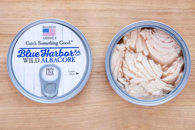 two can of Blue Harbor Tuna one of them opened
