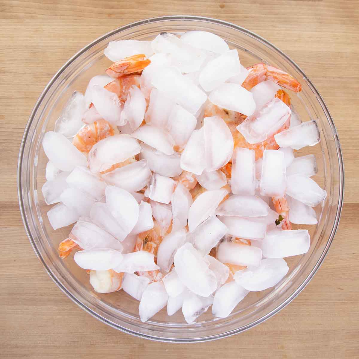 shrimp and ice in a large bowl