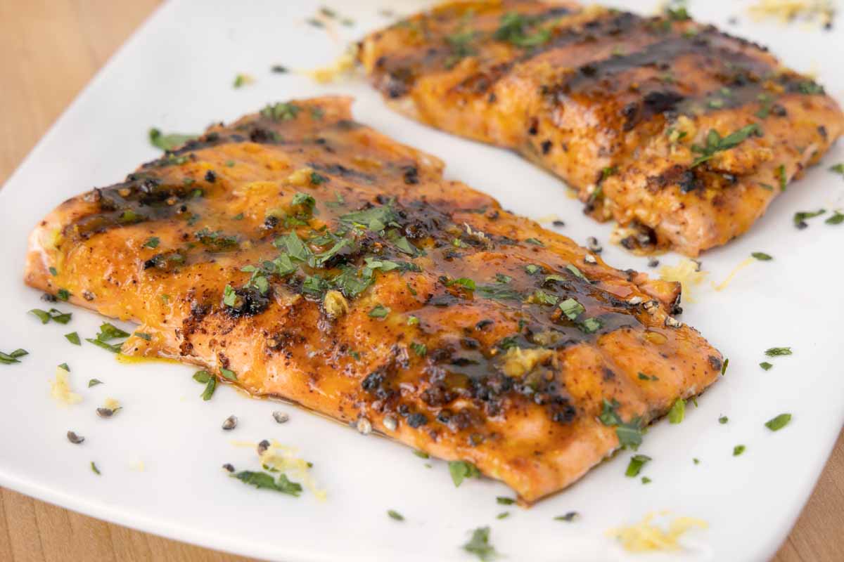 close up of honey mustard salmon on a white platter