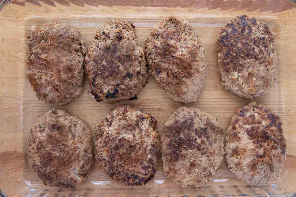 browned salisbury steaks in baking dish