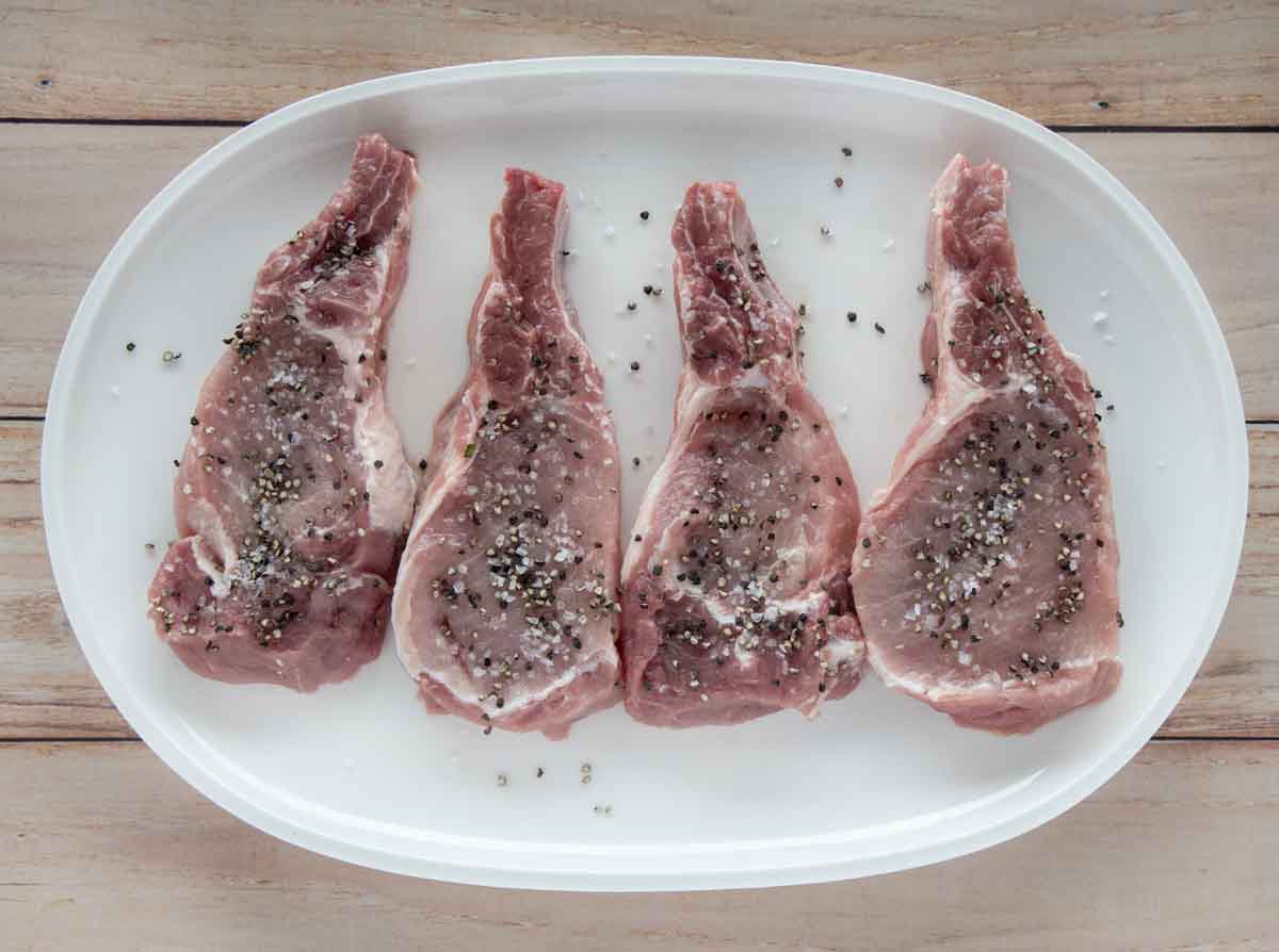 seasoned chops on a white platter