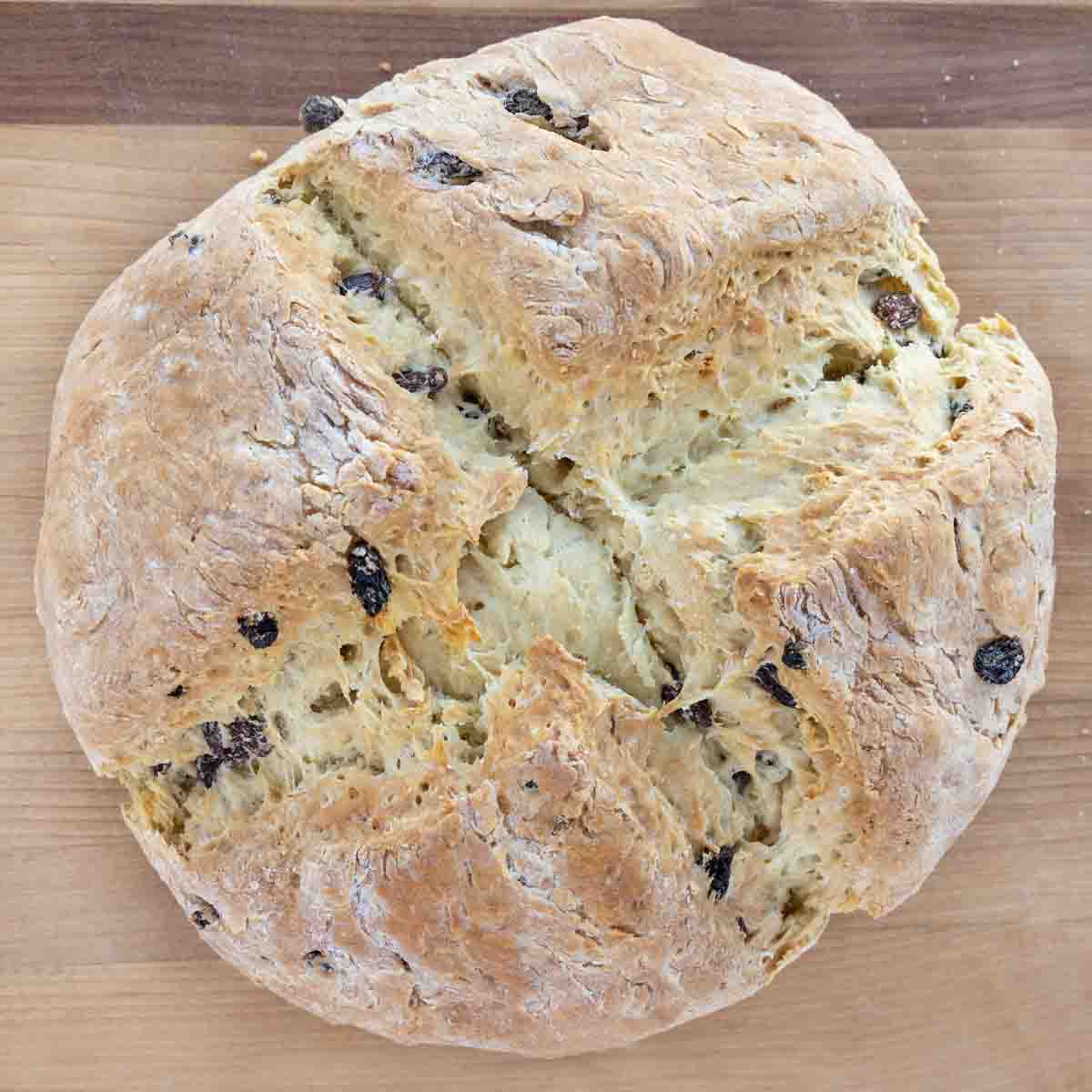 loaf of Irish soda bread on cutting board