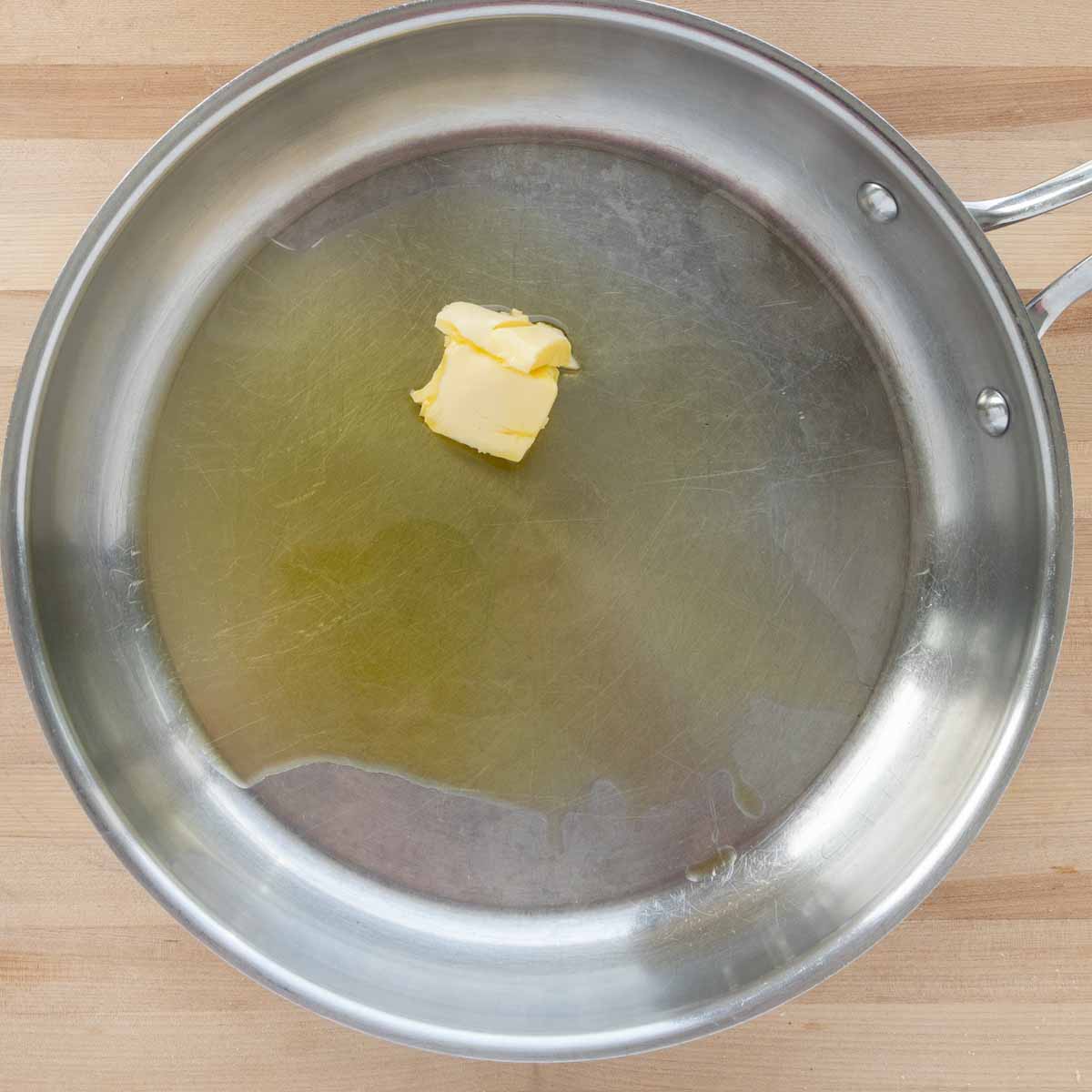 olive oil and butter in a large saute pan