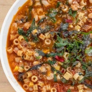 view of pasta fagioli in a white bowl
