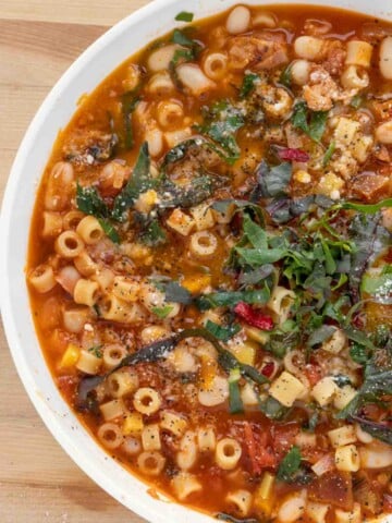 view of pasta fagioli in a white bowl