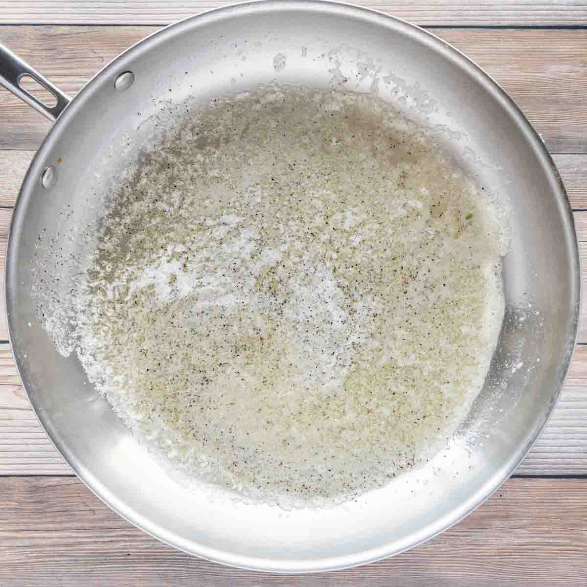 melted butter and black pepper in a large skillet