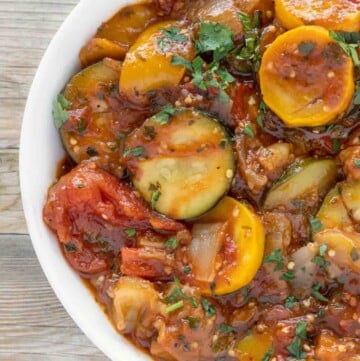 partial view of ratatouille in a white bowl