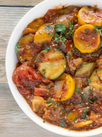 partial view of ratatouille in a white bowl