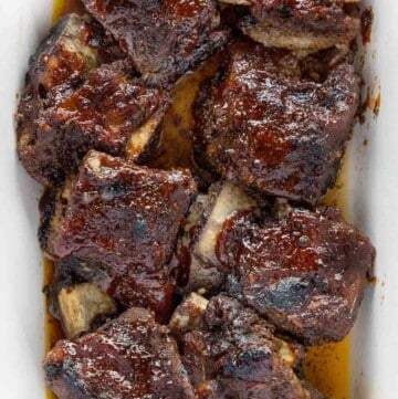 Barbecued short ribs in a white casserole