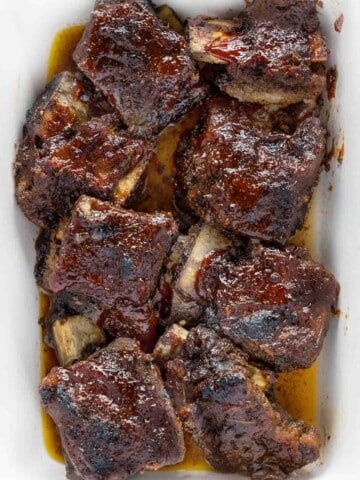 Barbecued short ribs in a white casserole