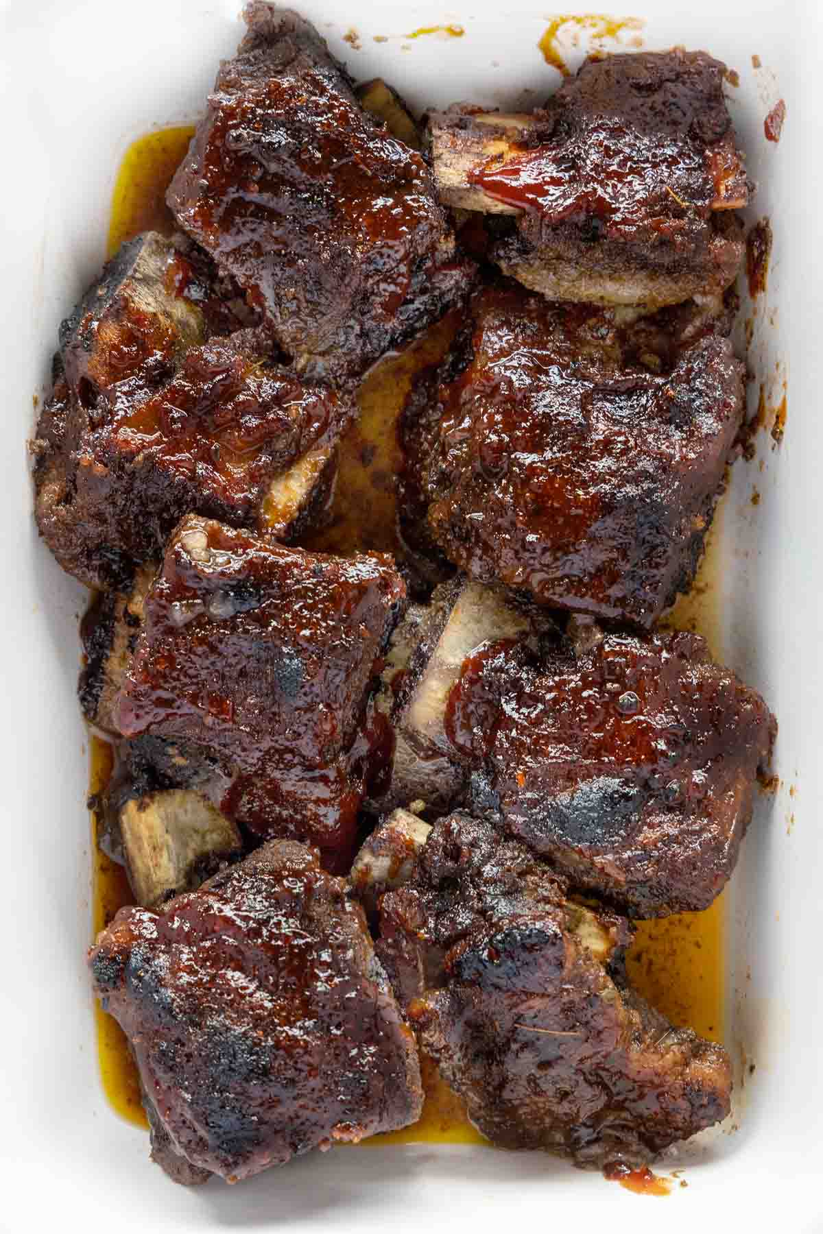 Barbecued short ribs in a white casserole
