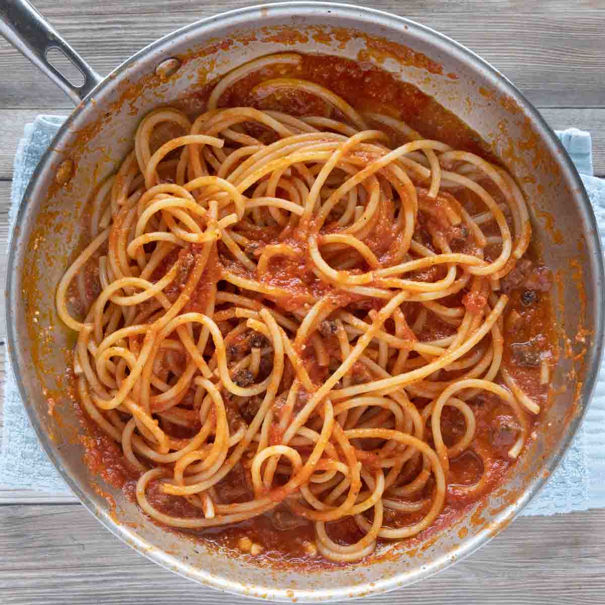 finished bucatini all' amatriciana in a skillet