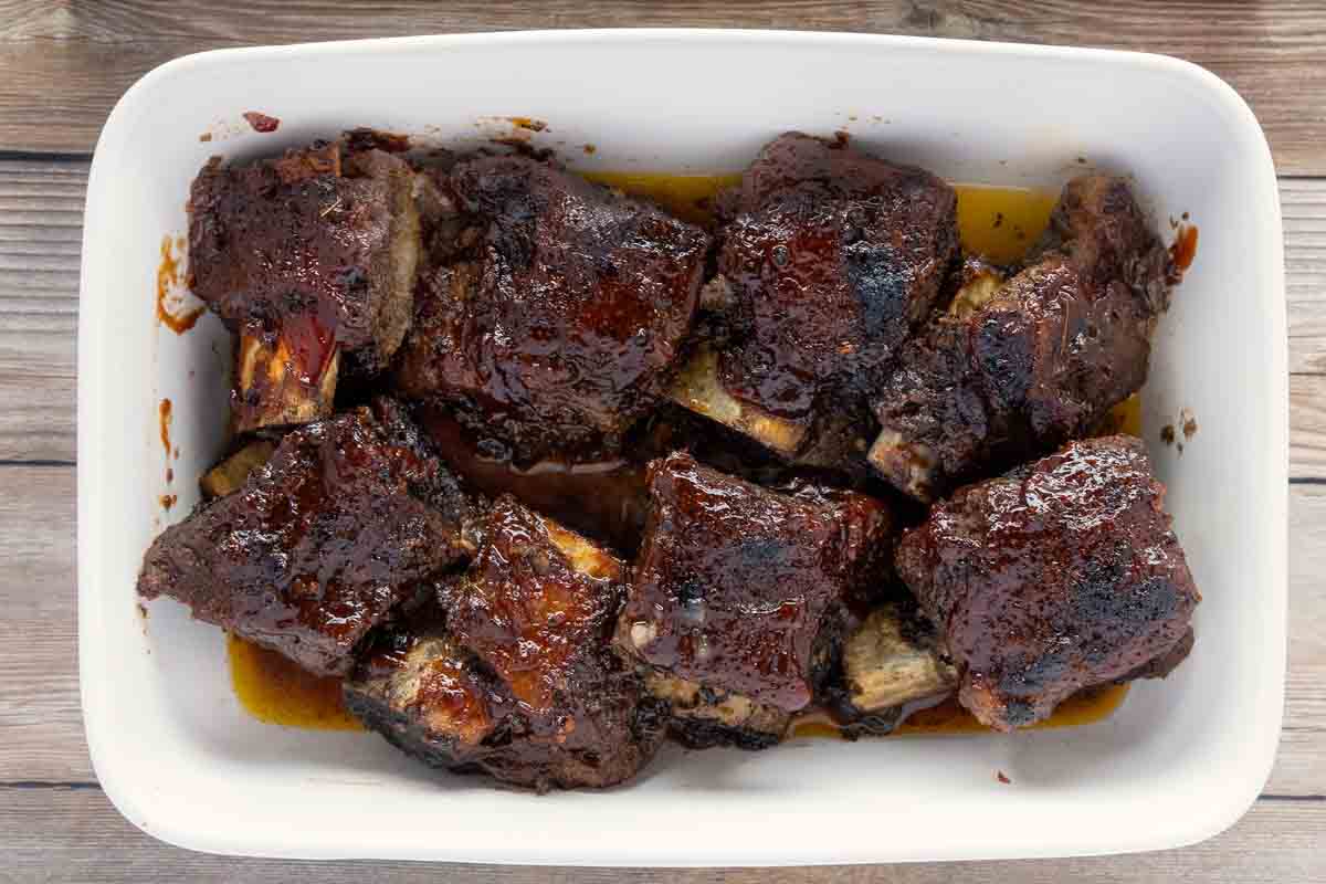 Bbq beef short ribs in white serving dish