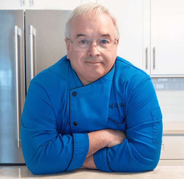 chef dennis in blue coat