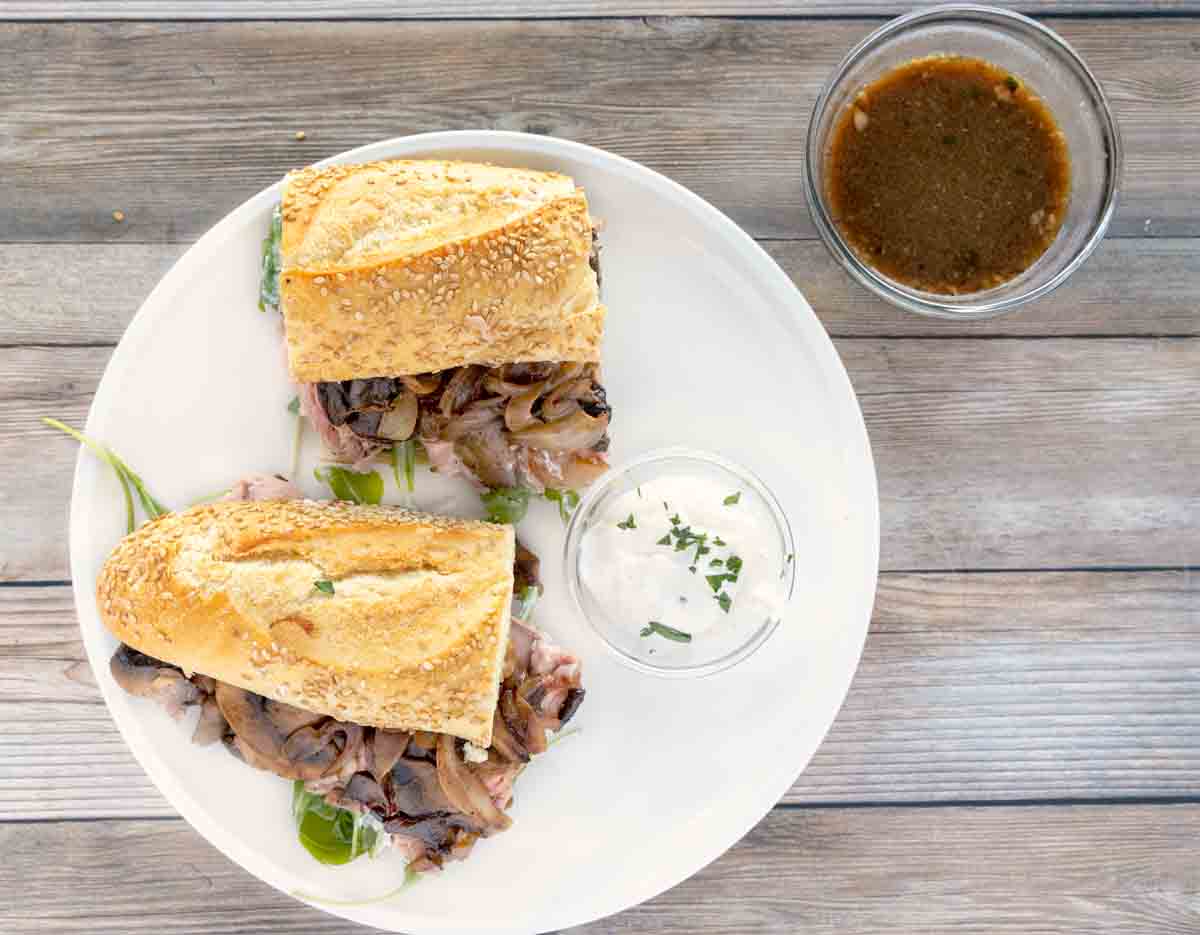 prime rib sandwich on white plate