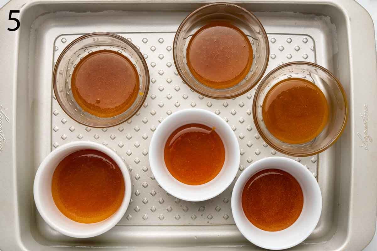 caramel in ramekins in baking dish