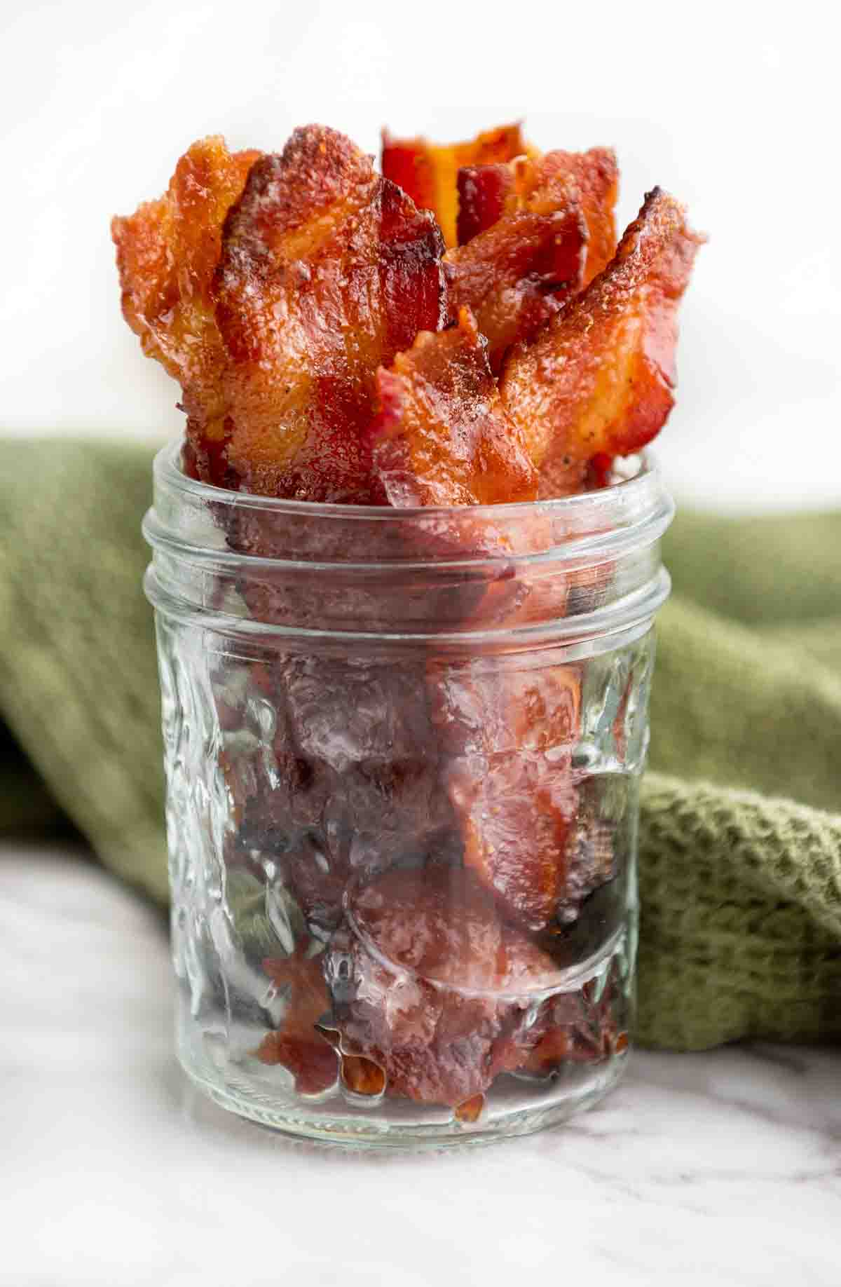 candied bacon in a glass jar