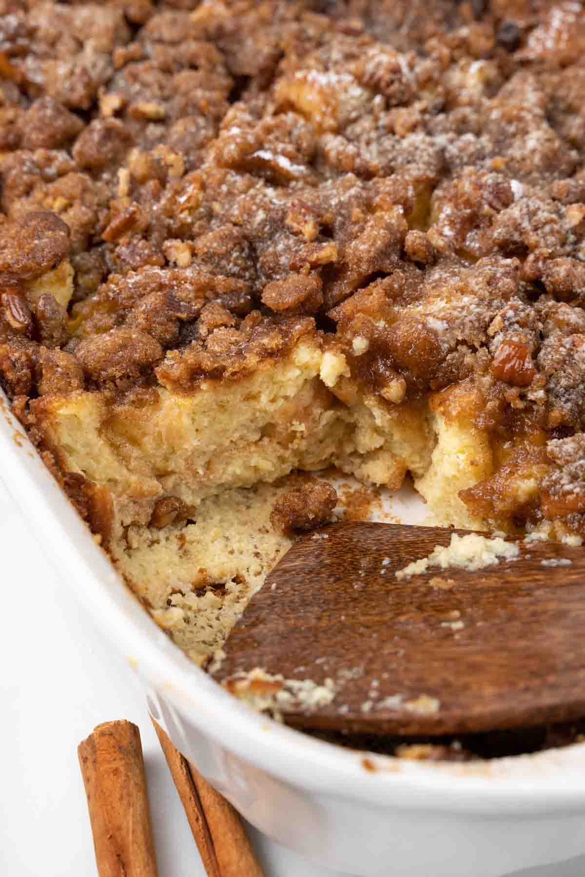 French toast casserole with piece cut out.