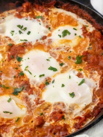 eggs in purgatory in a cast iron skillet.