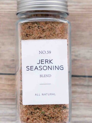 Glass jar of jerk seasoning blend.