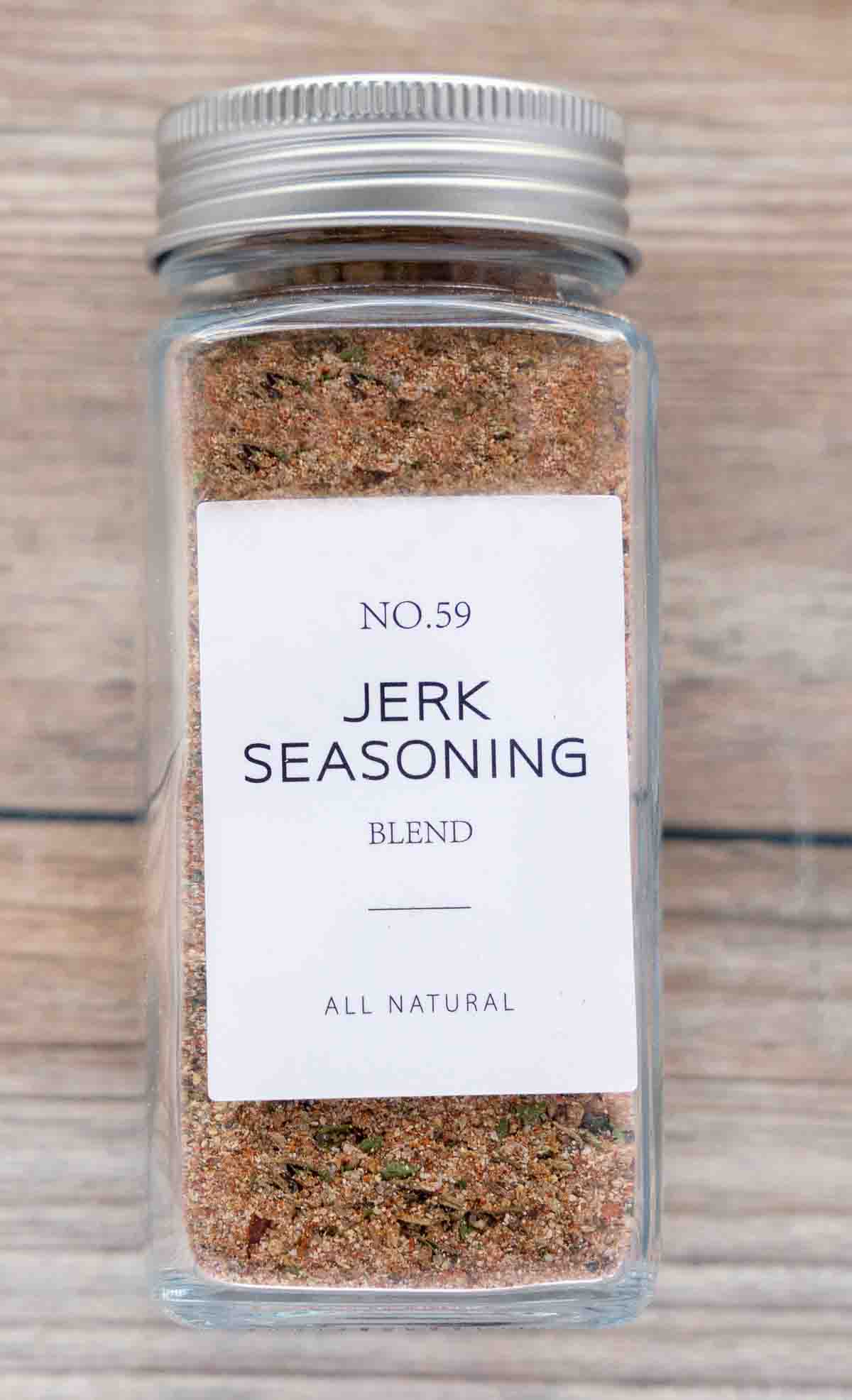 Glass jar of jerk seasoning blend.