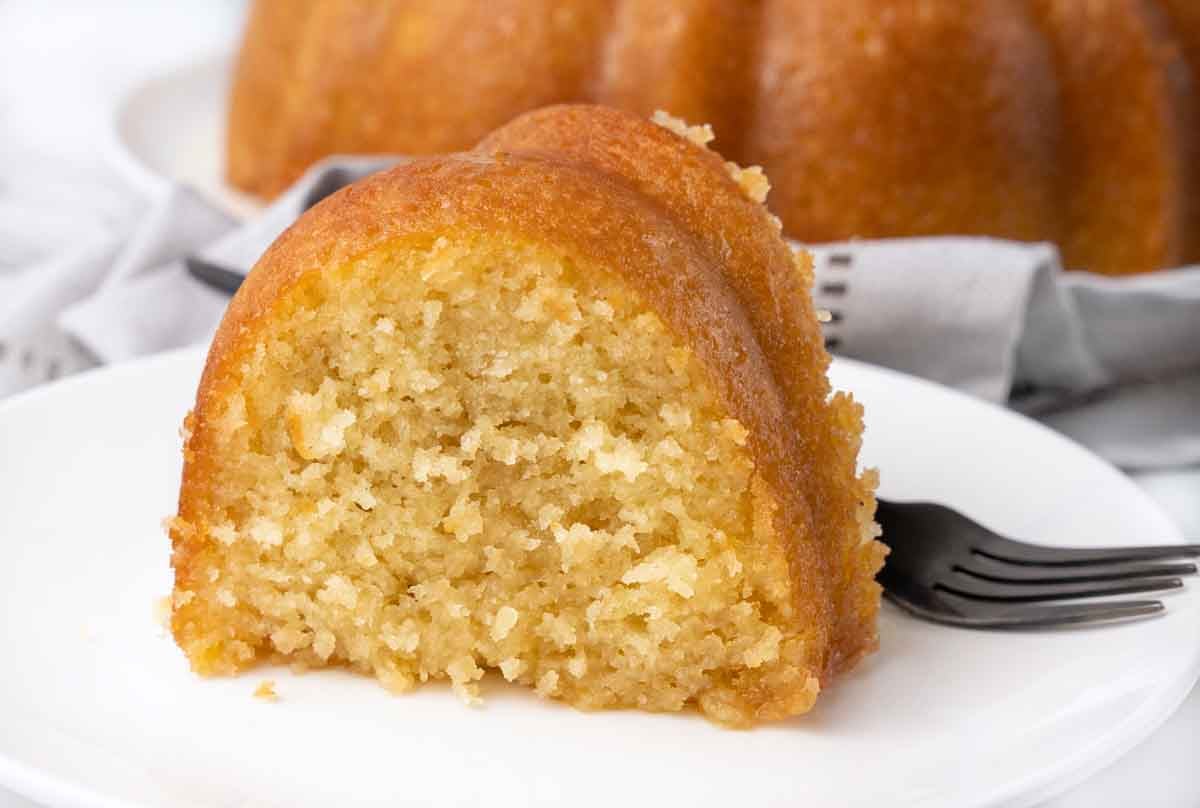 slice of Kentucky butter cake on white plate.