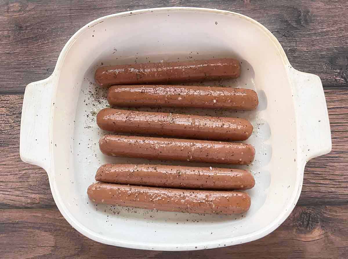 prepared frankfurters in pan.