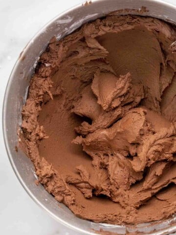 chocolate buttercream frosting in a mixing bowl.