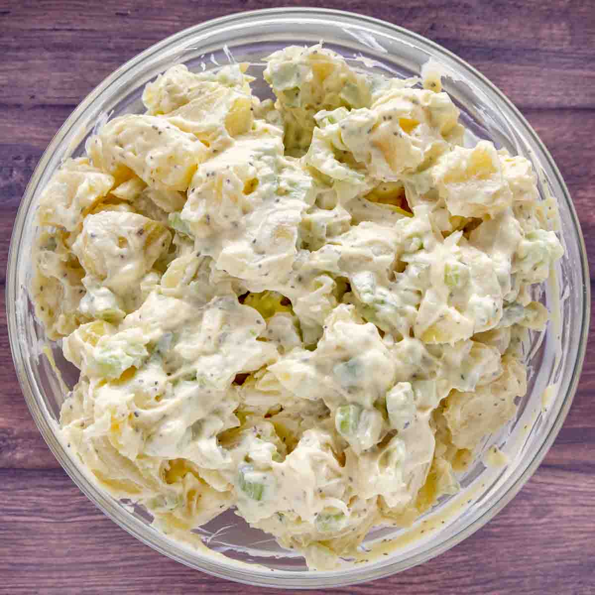 finished potato salad in a glass bowl.