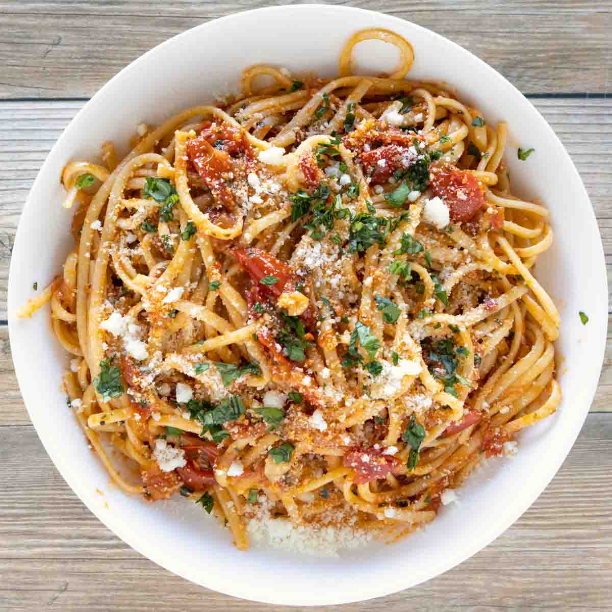 Pasta Napoletana in a white bowl.