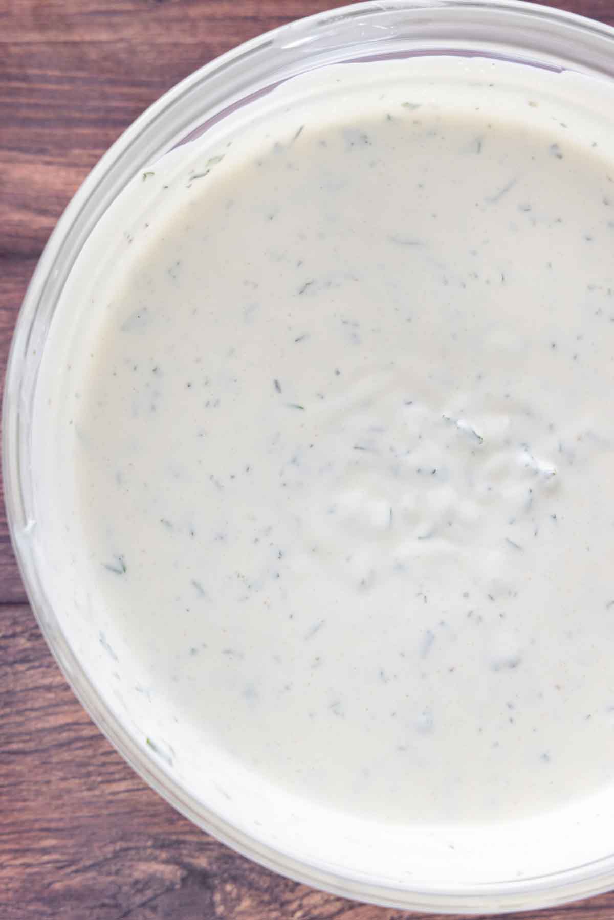 The completed homemade buttermilk ranch dressing recipe in a glass bowl.