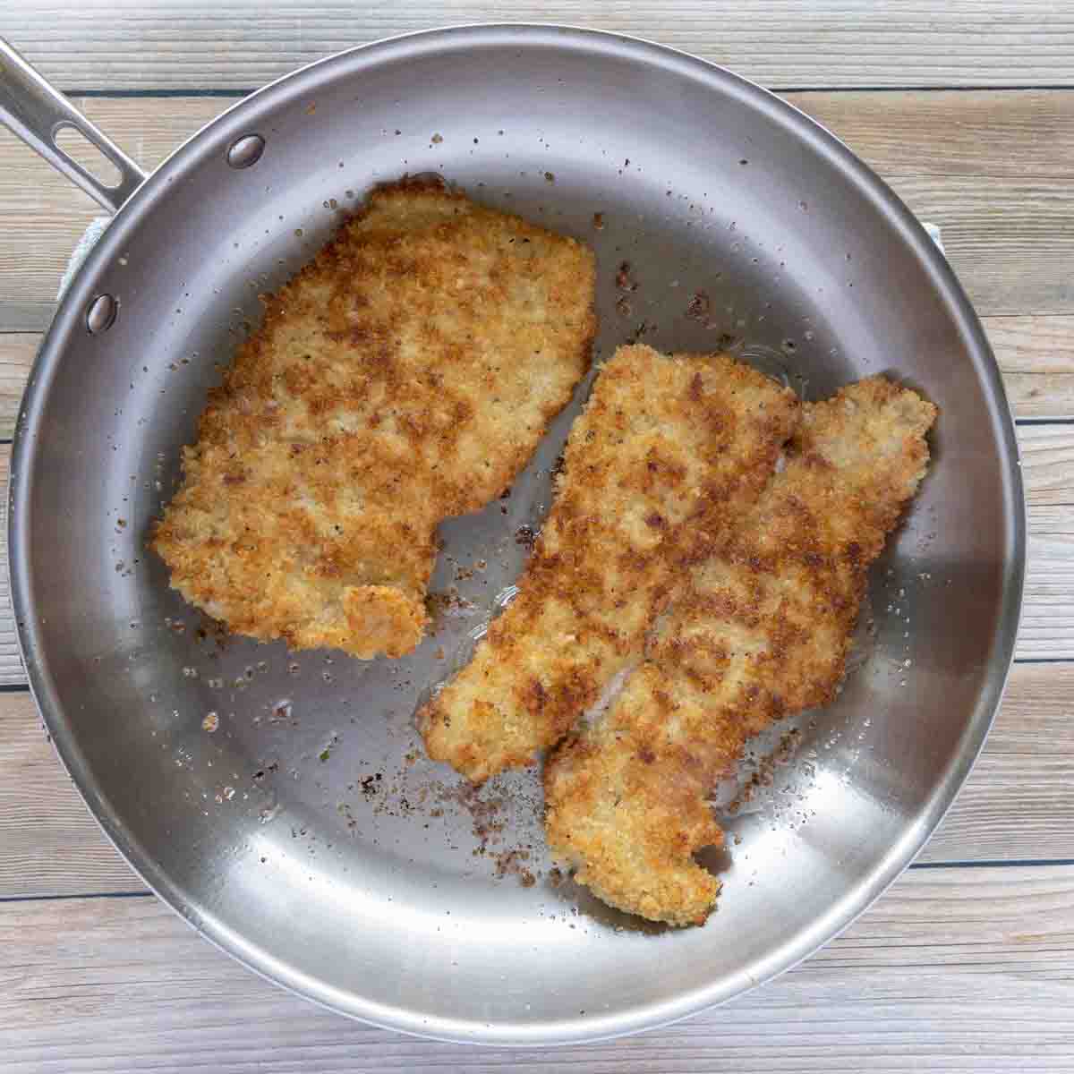 golden brown sautéed veal in pan.