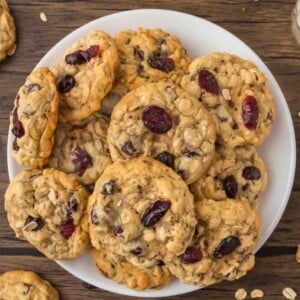 cranberry oatmeal cookies on a white plate.